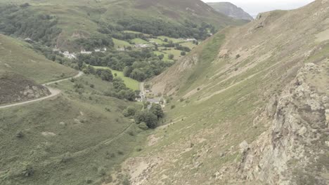 Capelulo-Penmaenmawr-Welsh-mountain-coastal-view-down-valley-aerial-north-wales-rising