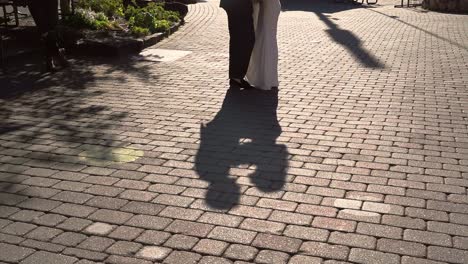 Shadow-Silhouette-Of-Bride-And-Groom-Embracing-And-Kissing-Each-Other