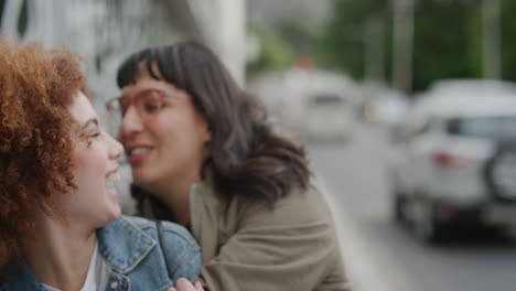 portrait of happy woman suprise hugging friend diverse friends embracing laughing enjoying friendship hang out together in urban city street background