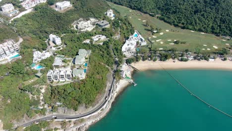 Hong-Kong-Repulse-Bay-skyline-with-luxury-residential-complexes-on-a-beautiful-clear-day,-Aerial-view