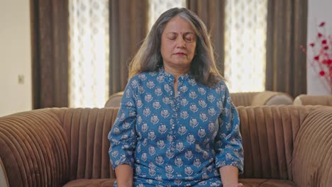 indian woman doing meditation and yoga exercise