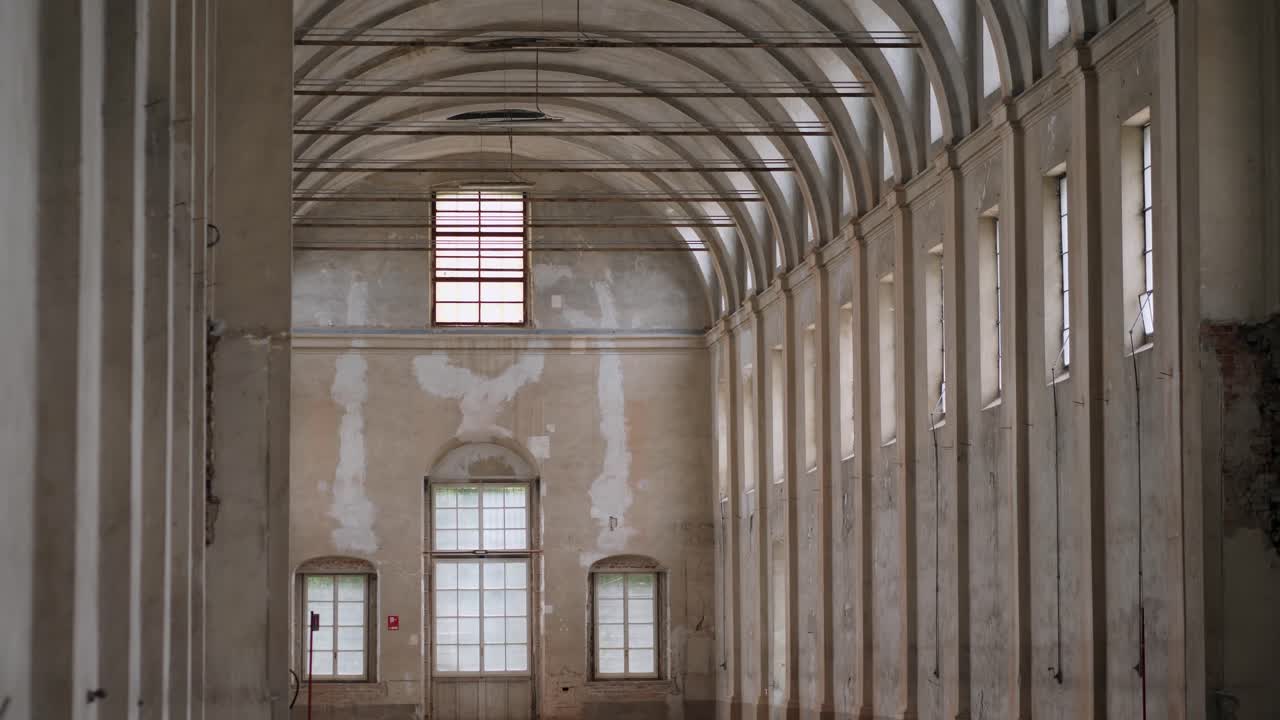 Empty White Interiors without People in an old Hospital Building in Parma, Italy
