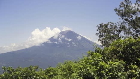 panning left to reveal an active volcano