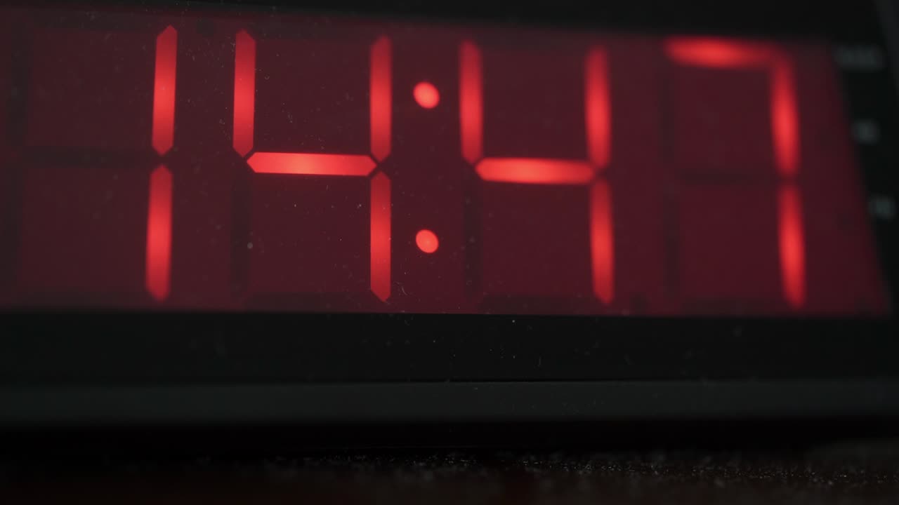 Digital alarm clock with big red digits