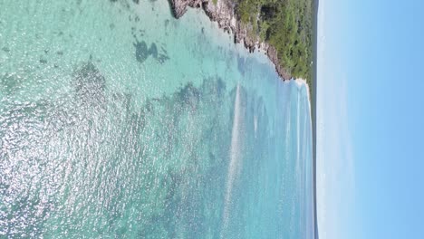 Bay-Las-Aguilas-Beach-In-Pedernales,-Dominican-Republic_vertical-Shot