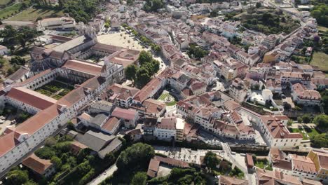 quaint and charming alcobaca aerial cityscape with famous medieval monastery