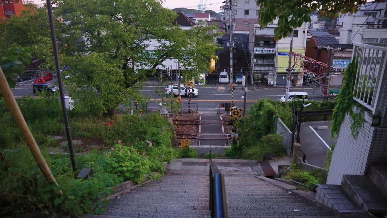 Peaceful Japanese Town of Onomichi, Tilt Reveal From Staircase to Neighborhood