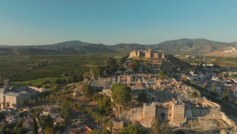 Drone over ruins of the ancient city of Selcuk in Turkey, historical leftover, stunning landscape around, copy space, pedestal aerial shot