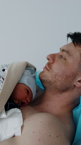 newborn baby with father