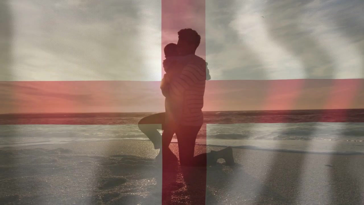Vertical video: Man reaching lifting woman on beach red cross overlay making lens flare sunset film