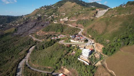 winding mountain road on a serpentine path in junquito, venezuela, aerial view