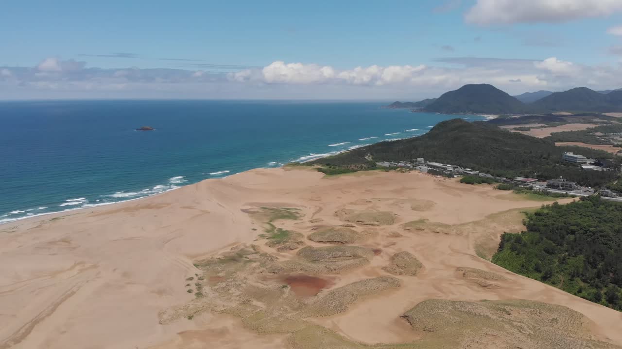 Aerial Drone Fly Over Tottori Sand Dunes and Sea at San’in Kaigan Geopark Japan