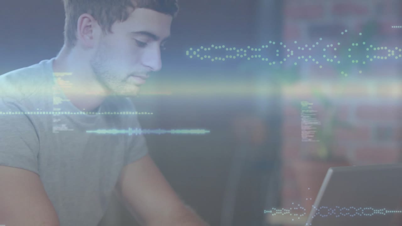 Man pushing coffee cup aside, typing on laptop, initiating code overlays and graphs for coding