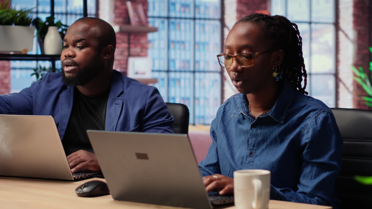 African American people at home office analyzes online business trends