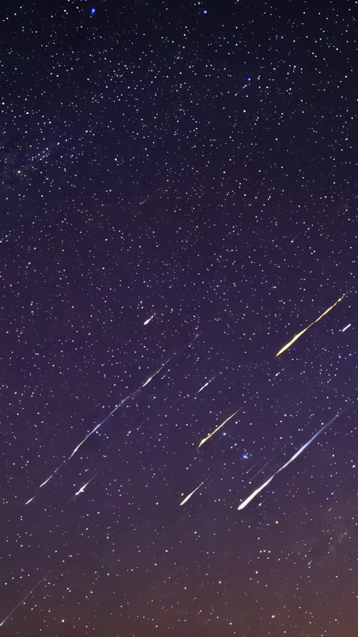 Vertical video: Creating meteors and fireballs crossing remote sky, space rocks entering air, stars