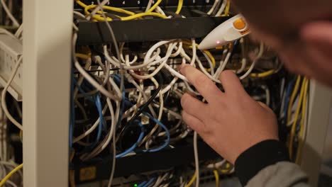 technician configures the network equipment in the server room