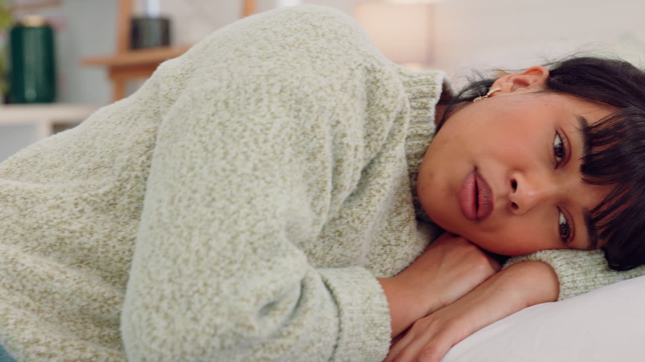 Woman Sleeping in Bed