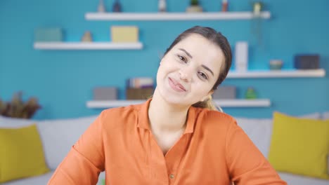 Happy-portrait-of-young-entrepreneur-woman-in-home-office.