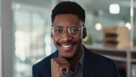 face, young businessman and glasses in office