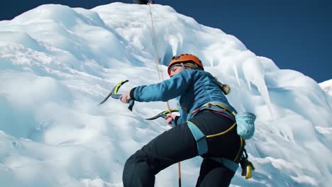ice climber ascending glacier