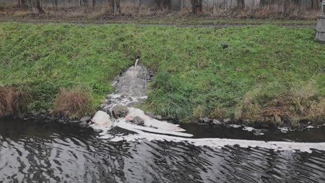 The-outlet-from-the-small-factory-into-the-river