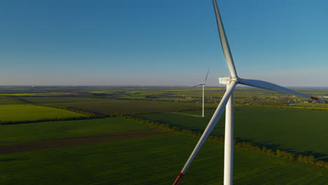 aerial view of technological wind towers operating. windmills producing power.