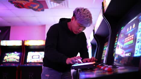 a player engaged in retro gaming action at an arcade, illuminated by colorful neon lights and surrounded by classic machines featuring vibrant screens