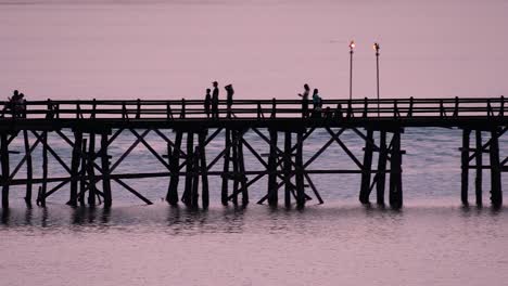 The-Mon-Bridge-is-an-old-wooden-bridge-located-in-Sangkla,-Thailand