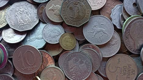 pile world coins from different countries