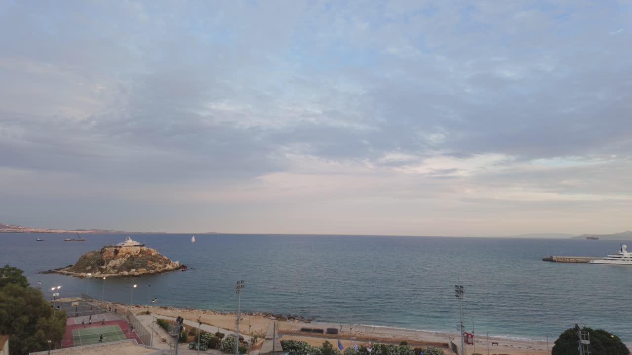 Beautiful Seascape with Island, Yacht, and Beach