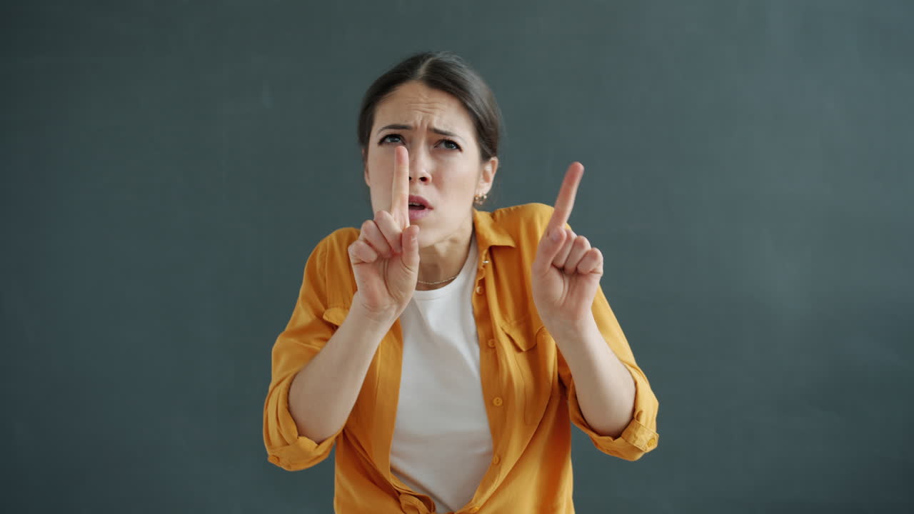 Woman gesturing disapproval