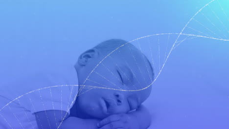 animation of spinning dna strand over caucasian baby sleeping