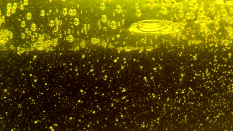 water oil bubbles  behind glass background