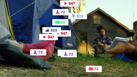 camping with friends, animation of social media notifications overlaying scene