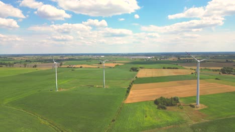 Aerial-view-of-powerful-Wind-turbine-farm-for-energy-production-on-beautiful-cloudy-sky-at-highland