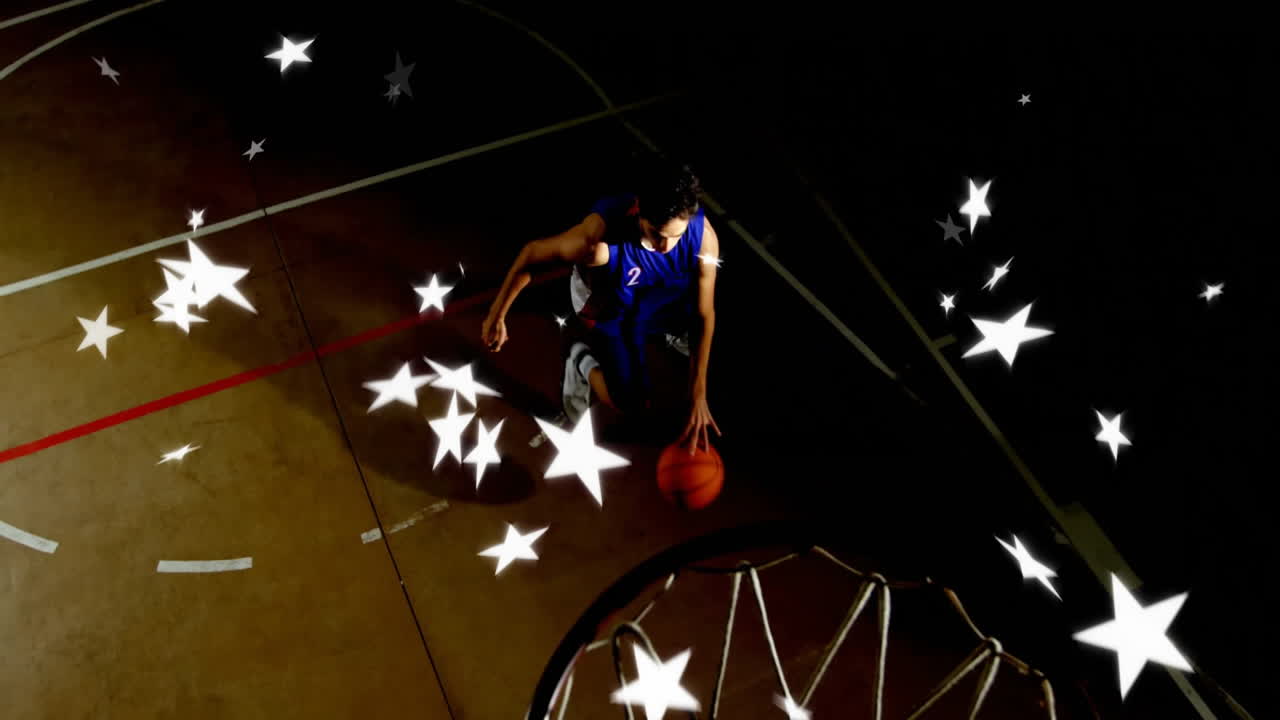 Basketball player dunking with animation of stars surrounding in school gym