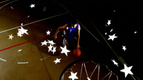 basketball player dunking with animation of stars surrounding in school gym