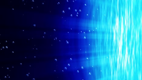 bubbles underwater rising to water surface. blue ocean illuminated the bright rays. water bubbles in the sea. loop animation.