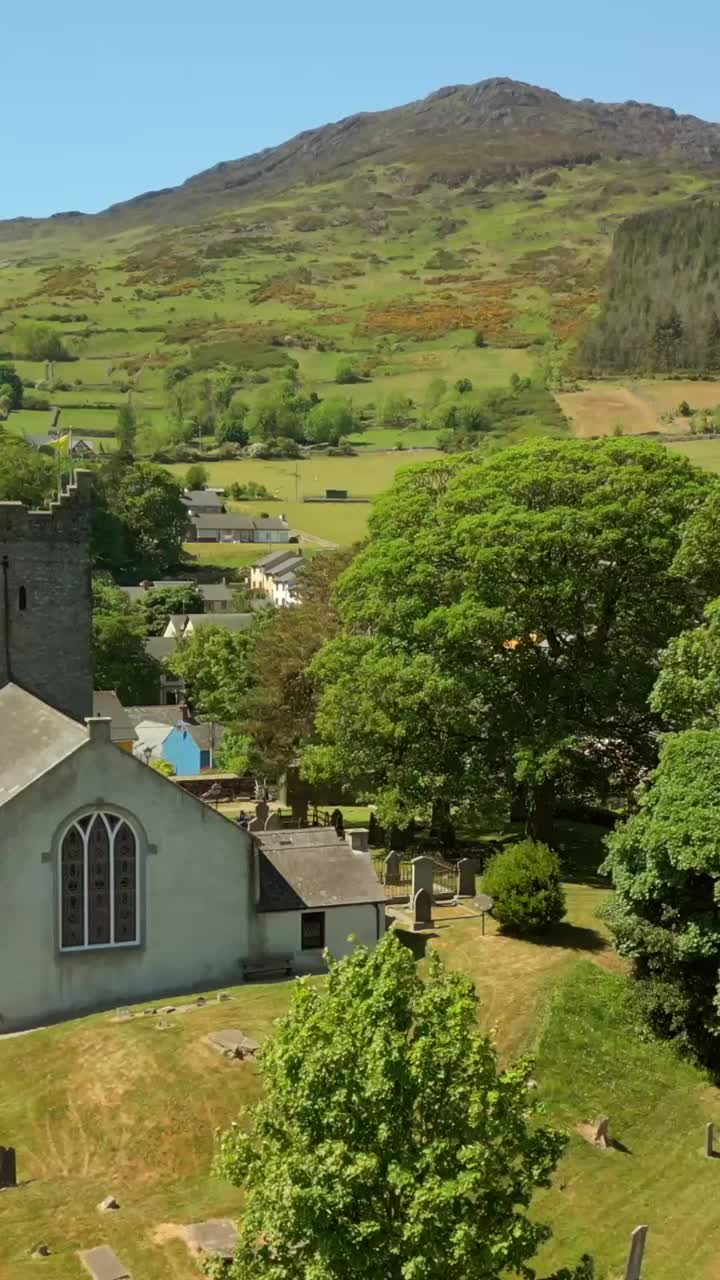 Slow, push-in social ratio aerial video of Carlingford in County Louth, Ireland. Filmed in 1080x1920, 60FPS and with Rec709 color