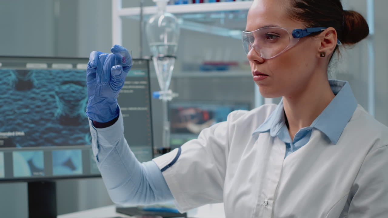 Scientist in Lab Analyzing DNA