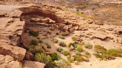 View-towards-impressive-natural-arch-formed-by-volcanic-eruptions