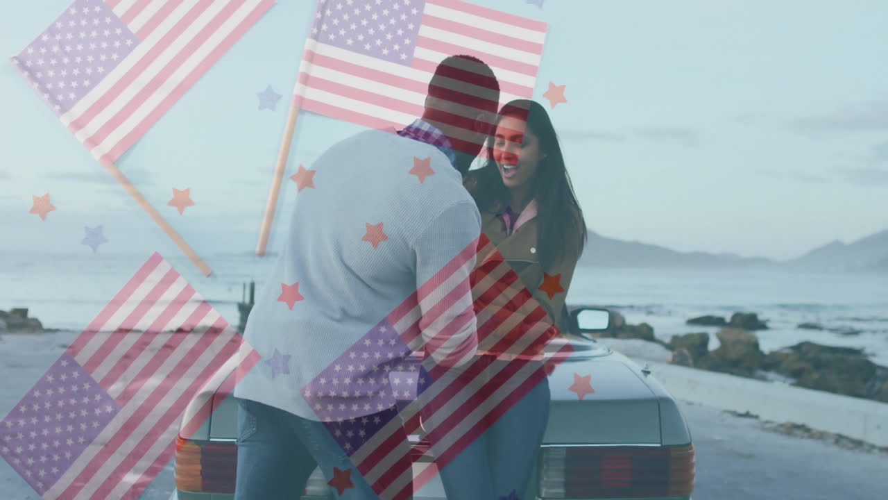 At beach, couple with American flag animation overlay, sharing moment together