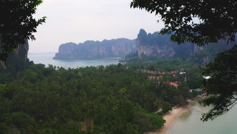 Zooming-on-village-and-tropical-rainforest-from-Railay-beach-viewpoint
