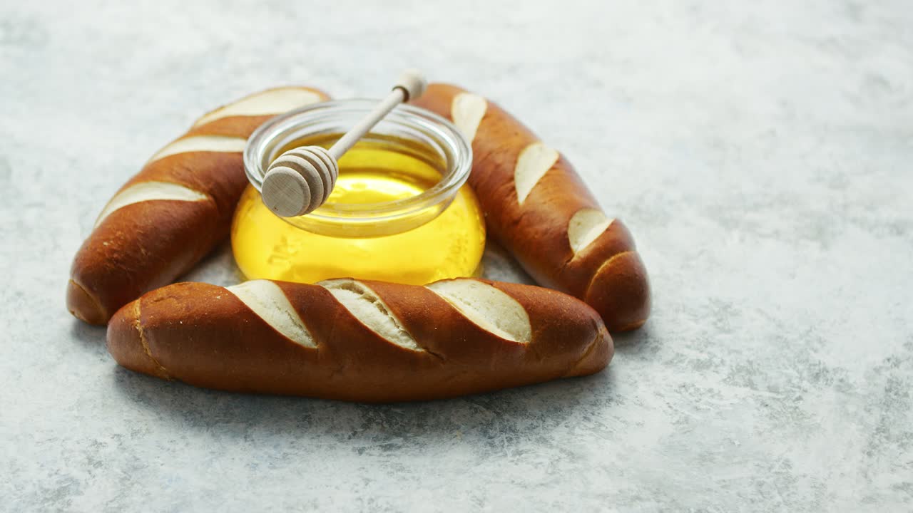 Baguettes with jar of honey