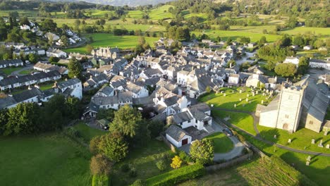 awkshead village lake district cumbria uk aerial footage pan at sunset