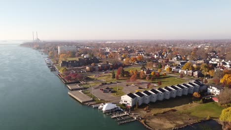 The Beautiful and Peaceful Scenery At Trenton City With Detroit River and Different Buildings - Aerial Shot