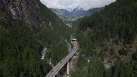 panning down looking at bridge over river in san bernardino valley, switzerland