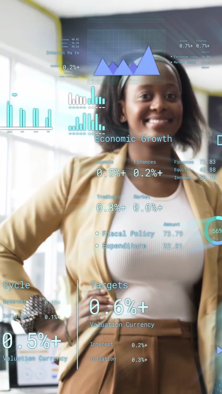 Vertical video: Woman in office hands akimbo as finance charts overlay shifting and smiling at data
