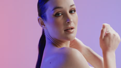 Portrait-of-caucasian-woman-with-brown-hair-and-make-up,-copy-space,-slow-motion