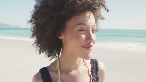mixed race woman looking at the sea view
